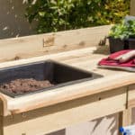 We compared over 20 potting benches and narrowed our search for the best potting bench to just 6 models, 4 wooden, some with metal tops and 2 all metal design.