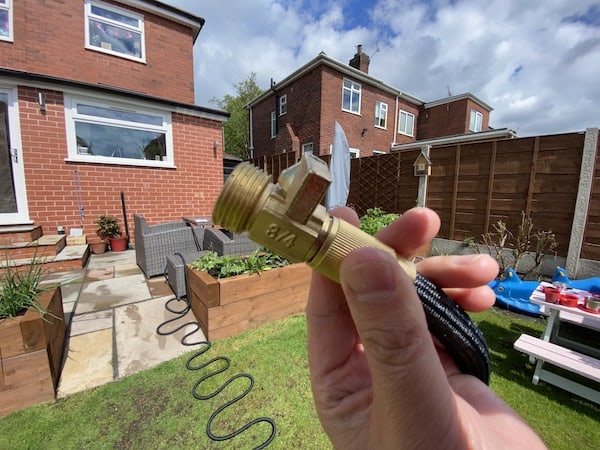 Quality brass fitting connected to hose