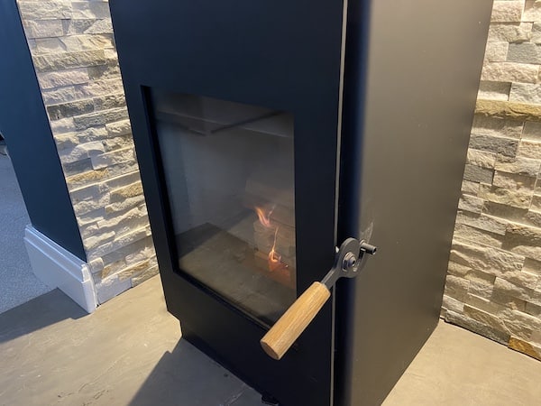 Leave stove door ajar for first 5 minutes while the kindling get burning well